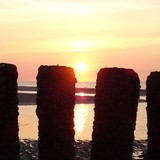 Zonsondergang op het strand in Nieuwvliet op vrijdagavond 31 juli 2015.