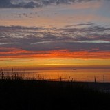 Zonsondergang op strand in Nieuwvliet op zaterdag 9 augustus 2015.