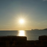 Zonsondergang bezien vanaf de wallen van het oude centrum in Alghero.