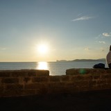 Zonsondergang bezien vanaf de wallen van het oude centrum in Alghero.