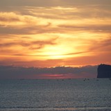 Zonsondergang bezien vanaf de wallen van het oude centrum in Alghero.